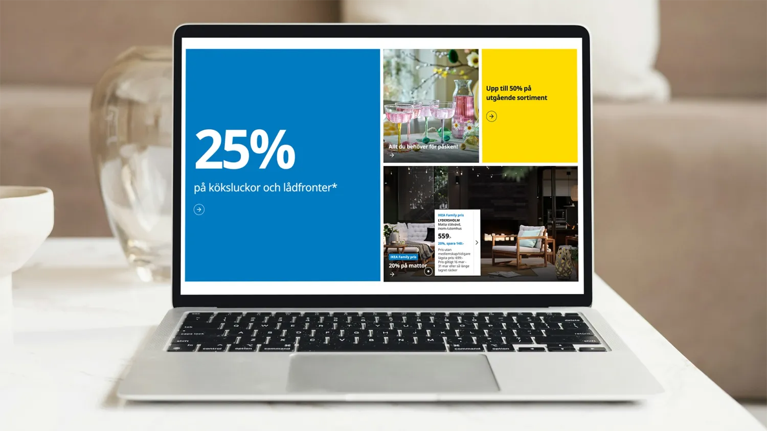 A laptop on a table showing a hero sektion from IKEA