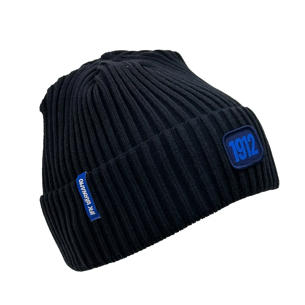 Stickad mössa, 1912, mörkblå