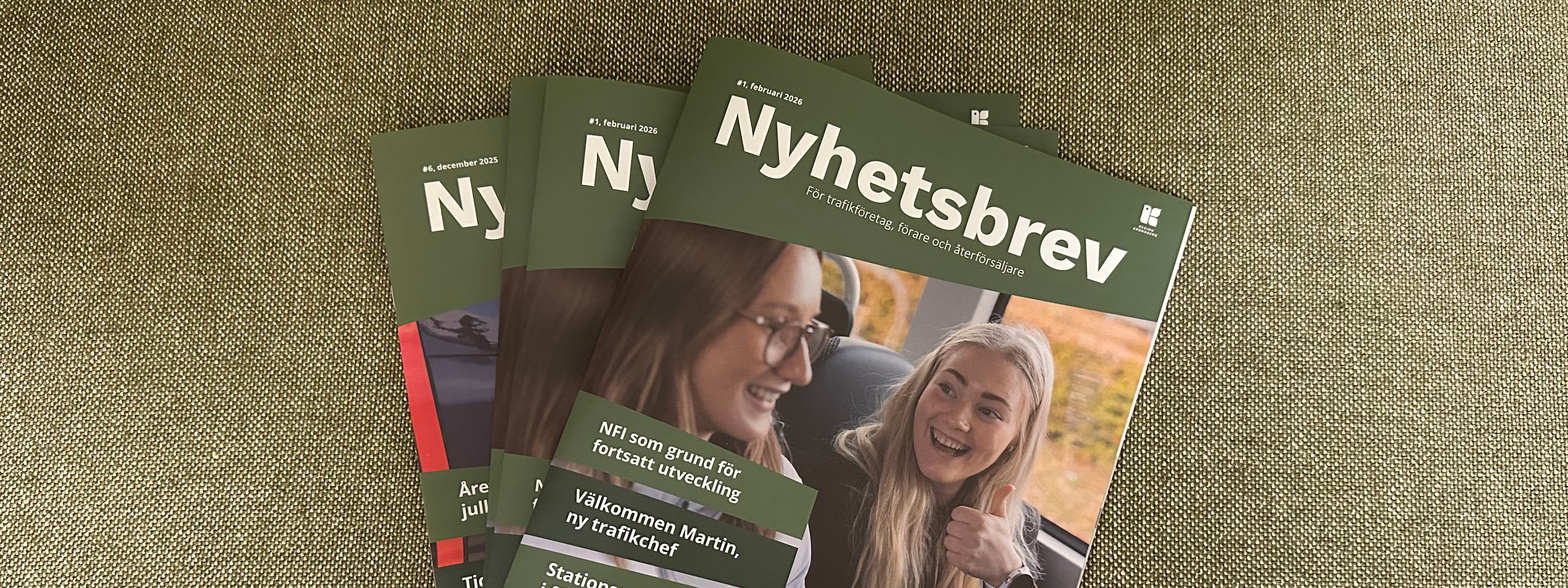 Bild på papperstidningar med rubrik Nyhetsbrev.