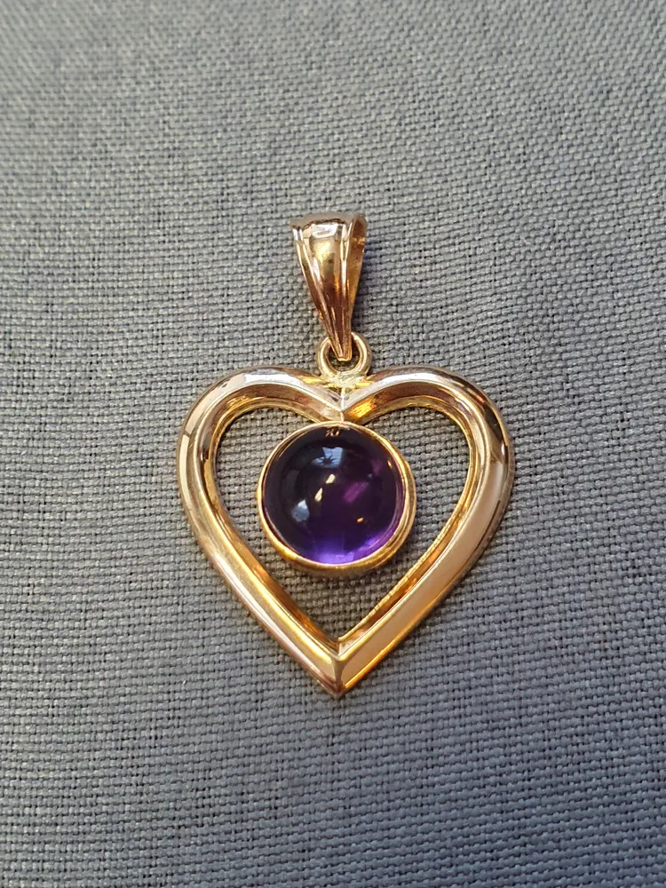 Hängesmycke hjärta m lila sten 2,3gr 18K