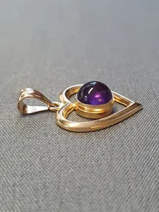 Hängesmycke hjärta m lila sten 2,3gr 18K