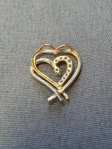 Hängsmycke, hjärta m diamanter 1,1gr 9K