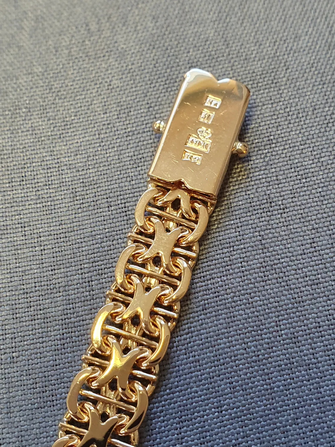 X-länk armband m stav 19,0cm 20,8gr 18K