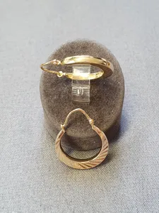 Creoler mönstrade 2,4gr 18K