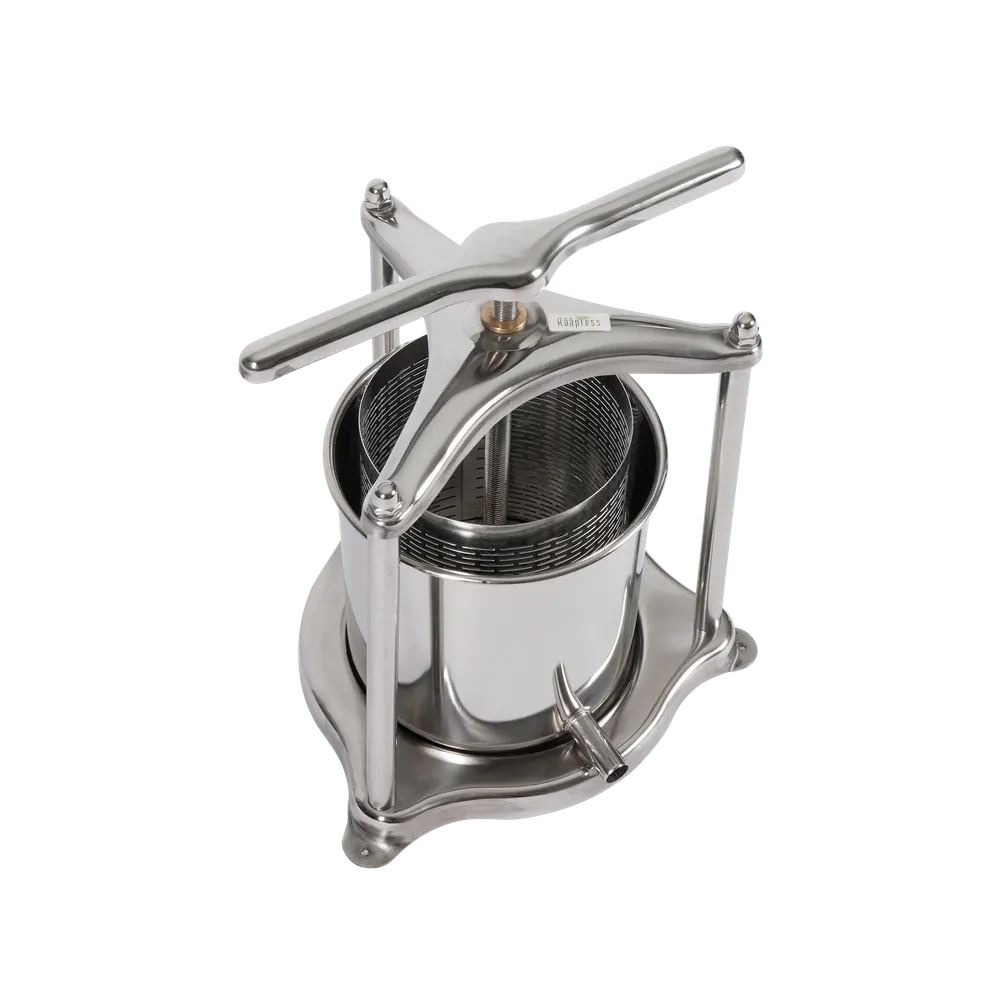 Skruvpress i rostfritt stål, vy uppifrån. uppsamlingsskål med utlopp i botten på sidan