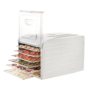 Frukt- og sopptørkeren med forlengede rustfrie stålrister, på ristene er oppskåret tørket frukt og grønnsaker