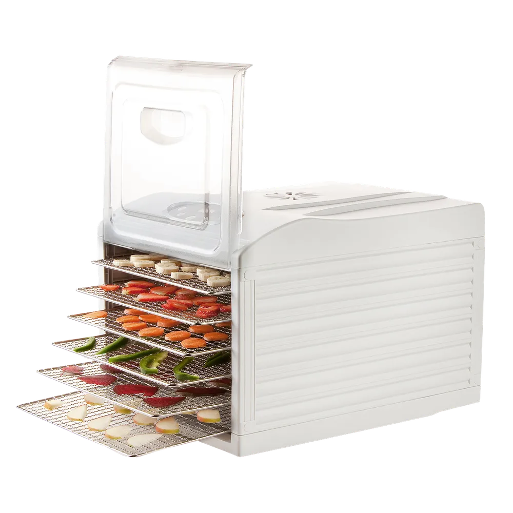 Frukt- og sopptørkeren med forlengede rustfrie rist, på ristene ligger fersk frukt og grønnsaker i skiver