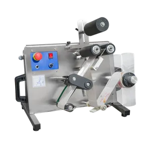 Etikettemaskin for flasker og bokser