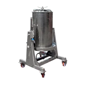 Sylinterimäinen ruostumattomasta teräksestä valmistettu hedelmäpuristin, joka on asennettu jalustalle, jossa on varoventtiili ja pohjaläpivienti