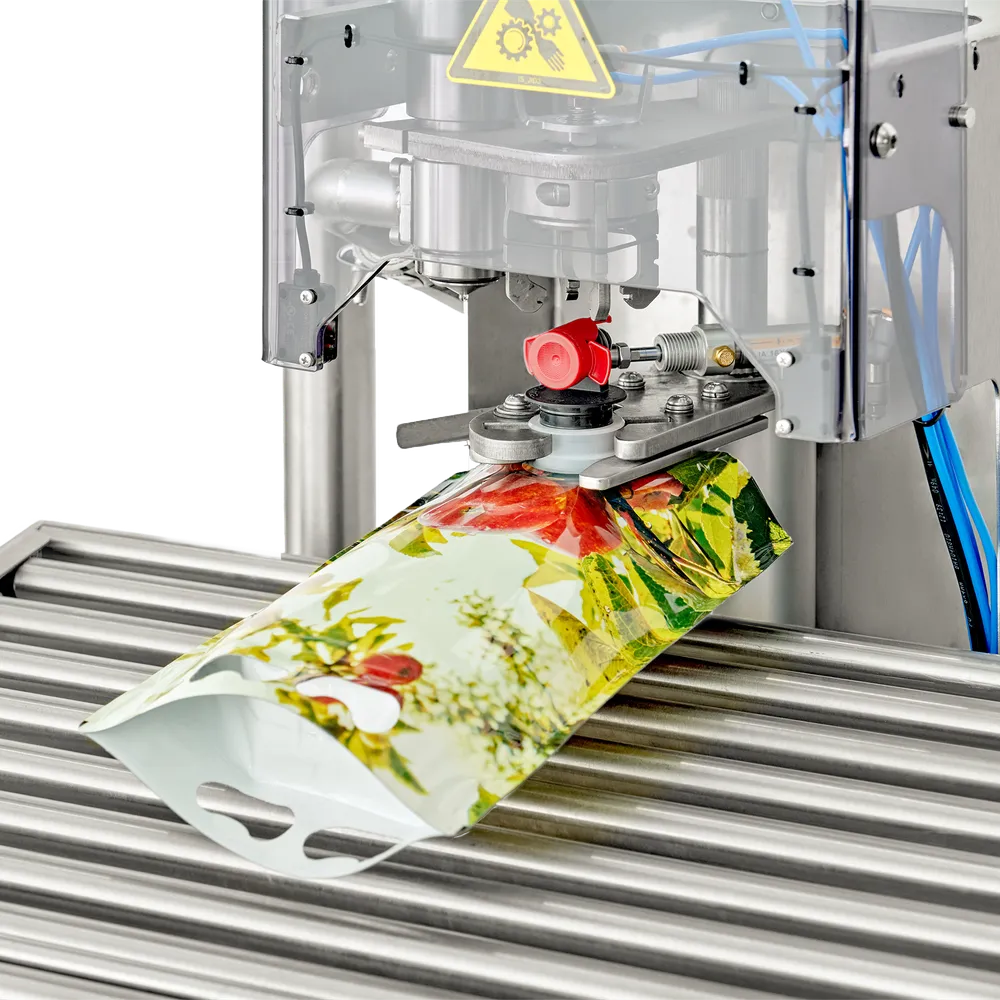 Översiktsbild på Automatisk Bag-In-Box-fyllare Autoflow i rostfritt stål med påse placerad i hållare