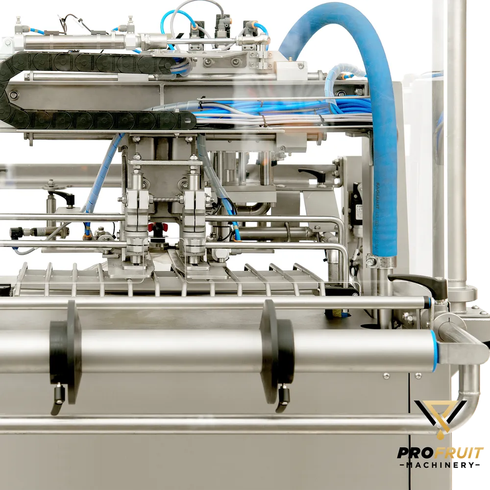 Närbild på maskinens hållare för bag-in-box påsar och ståpåsar, tillverkad i rostfritt stål