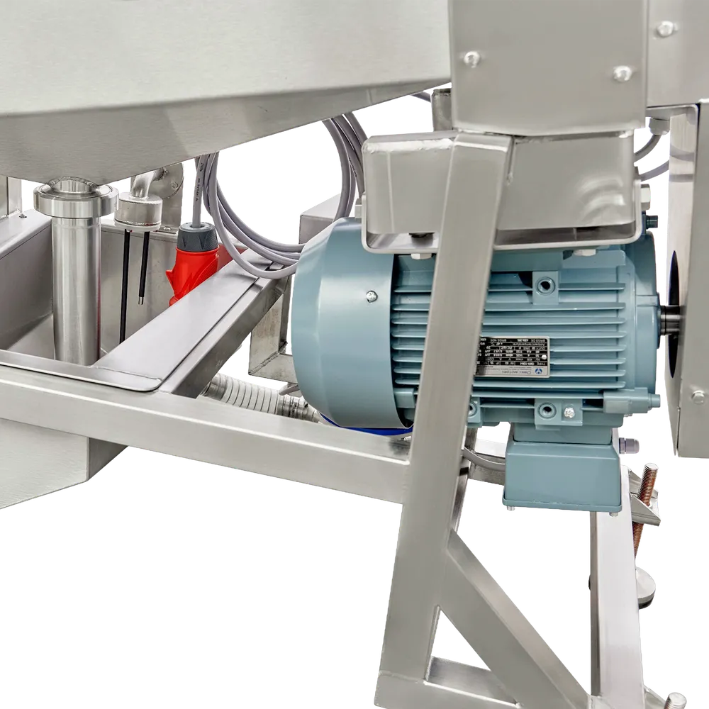 Billede af opsamlingsbeholder og pumpe under maskinen