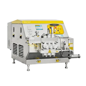 Bild med vinkel från sidan av den större homogenisator i rostfritt stål för fruktjuice