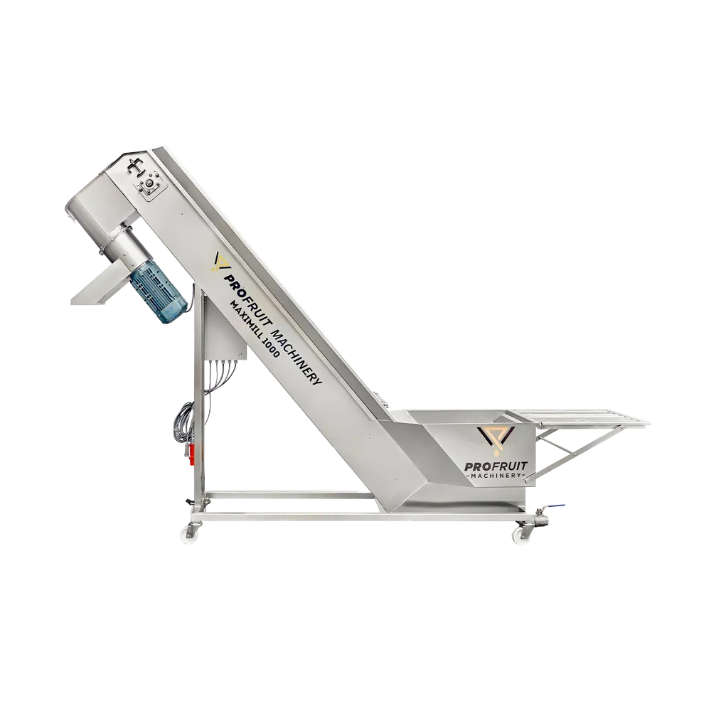 Stor maskine i rustfrit stål, der bruges til at vaske, transportere og knuse frugt