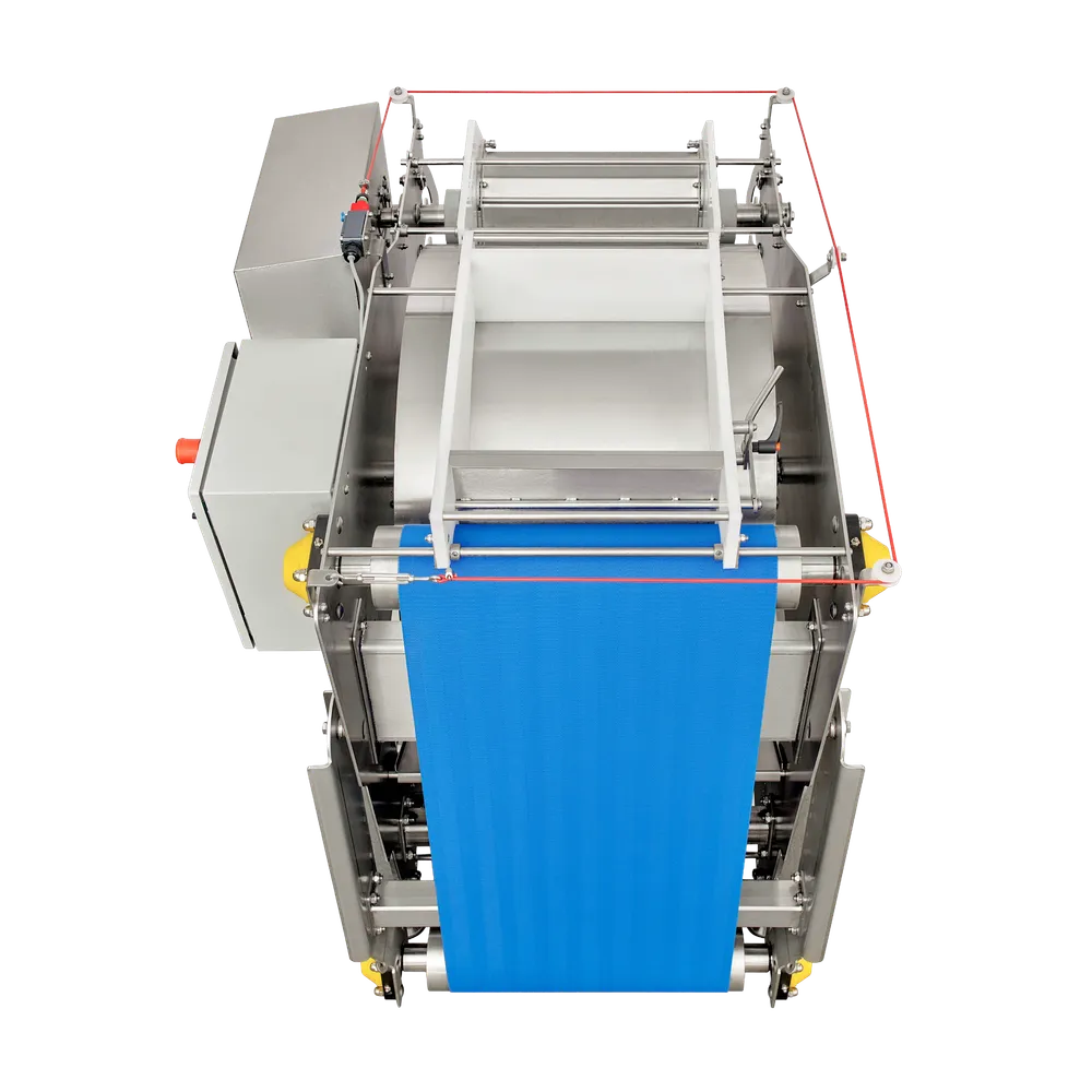 Maskin for fremstilling av juice som har et blått roterende belte som presser frukten