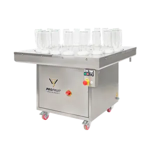 Puoliautomaattinen pullohuuhtelulaite, jossa on pyörivä pöytä