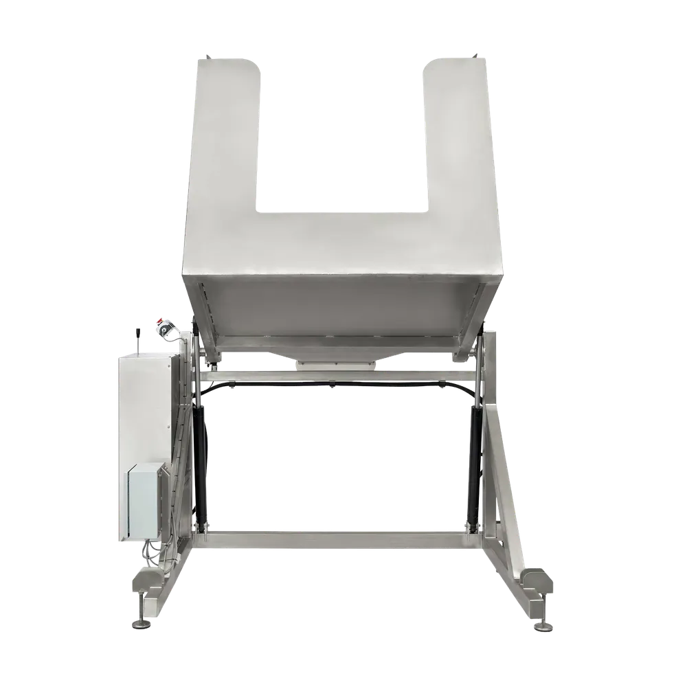 Kompakt maskine i rustfrit stål, der bruges til at tømme kasser med frugt i nedadgående position, set bagfra