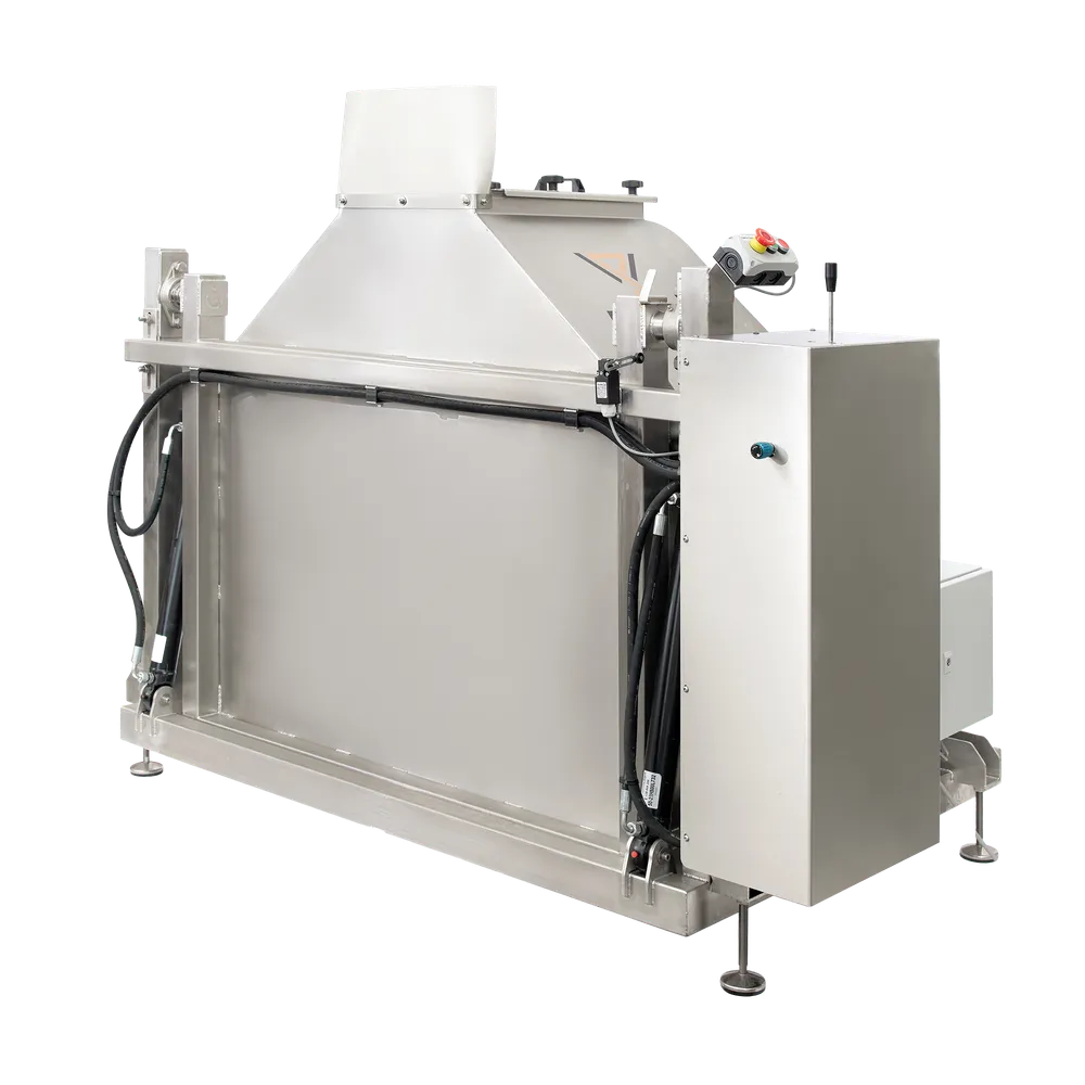 Kompakt maskine i rustfrit stål, der bruges til at tømme kasser med frugt i nedadgående position, set bagfra