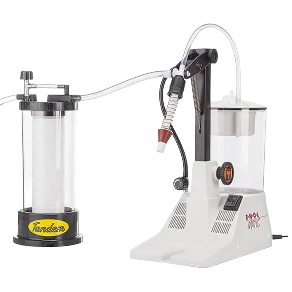 Vakuumfylleren koblet til en filterbeholder på sugeledningen