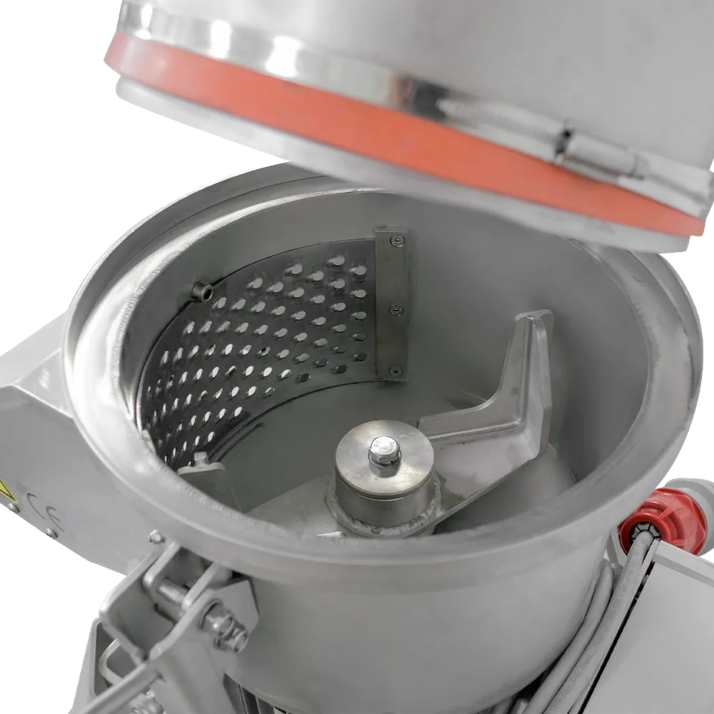 Nærbilde av knuseskive og justerbart knuseblad i Zottle fruktkvern MMS55