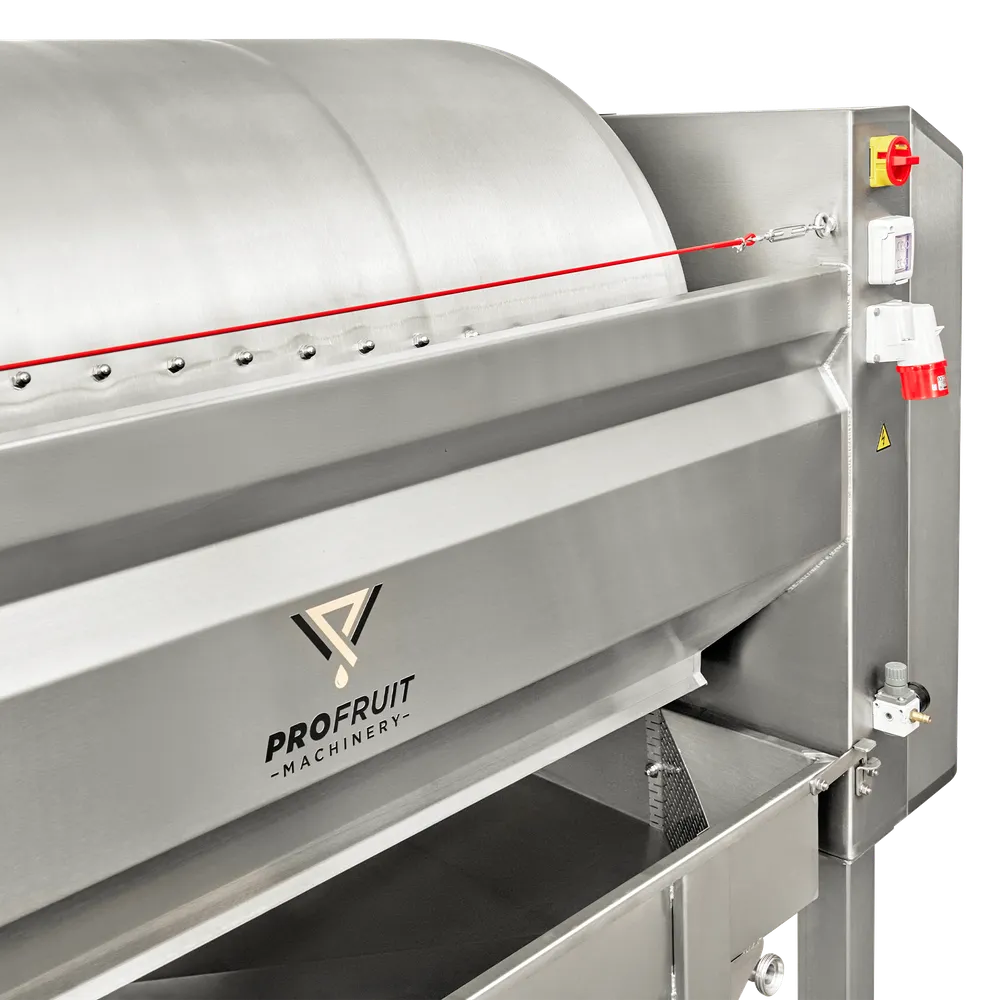 Runt pressens cylindertrumma är en röd vajer monterad, kopplad till en säkerhetsbrytare