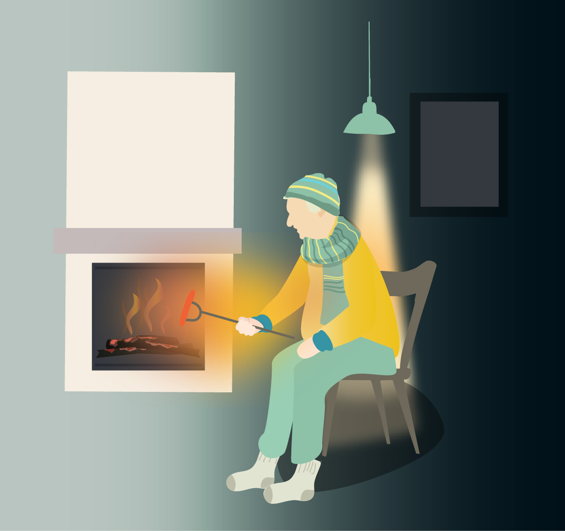 Ensam man som grillar korv vid en vedspis i ett mörkt rum.