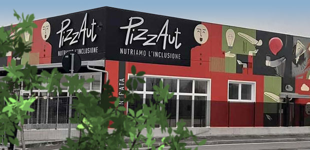Bidlen visar PizzAuts byggnad i Milano, Italien, en svartröd byggnad med PizzAuts logo.